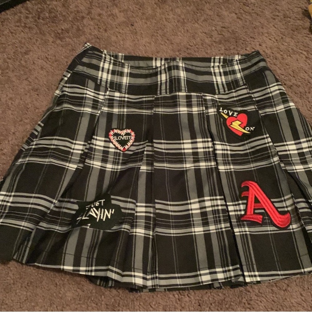 Plaid black skirt with patches
